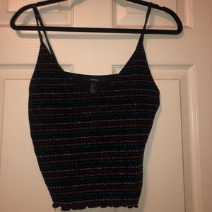 Black and multi colored stripped tank